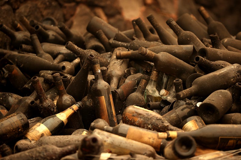 Burned bottles of wine sit in a pile at Castello di Amorosa that was destroyed by the Glass Fire on October 01, 2020 in Calistoga, California.