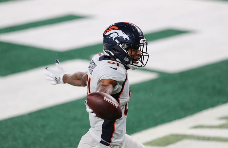Tim Patrick celebrates after catching a touchdown.