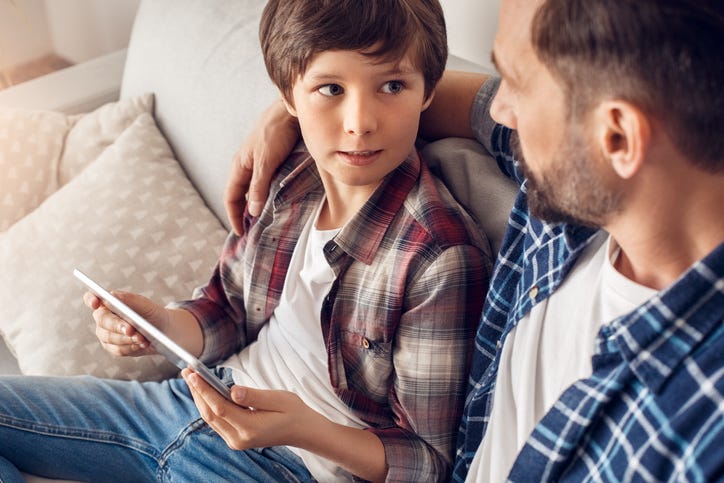 father and son talking