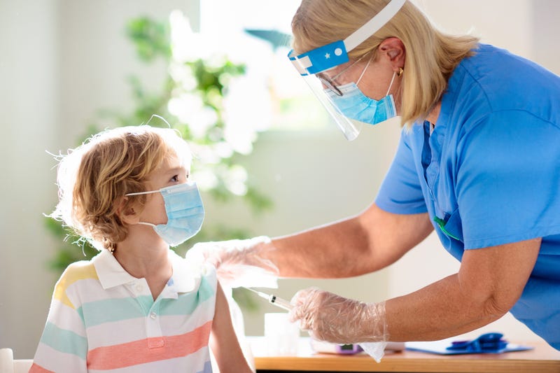 Child receiving vaccine