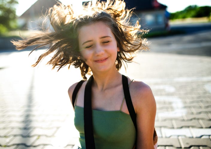 Girl On Sidewalk