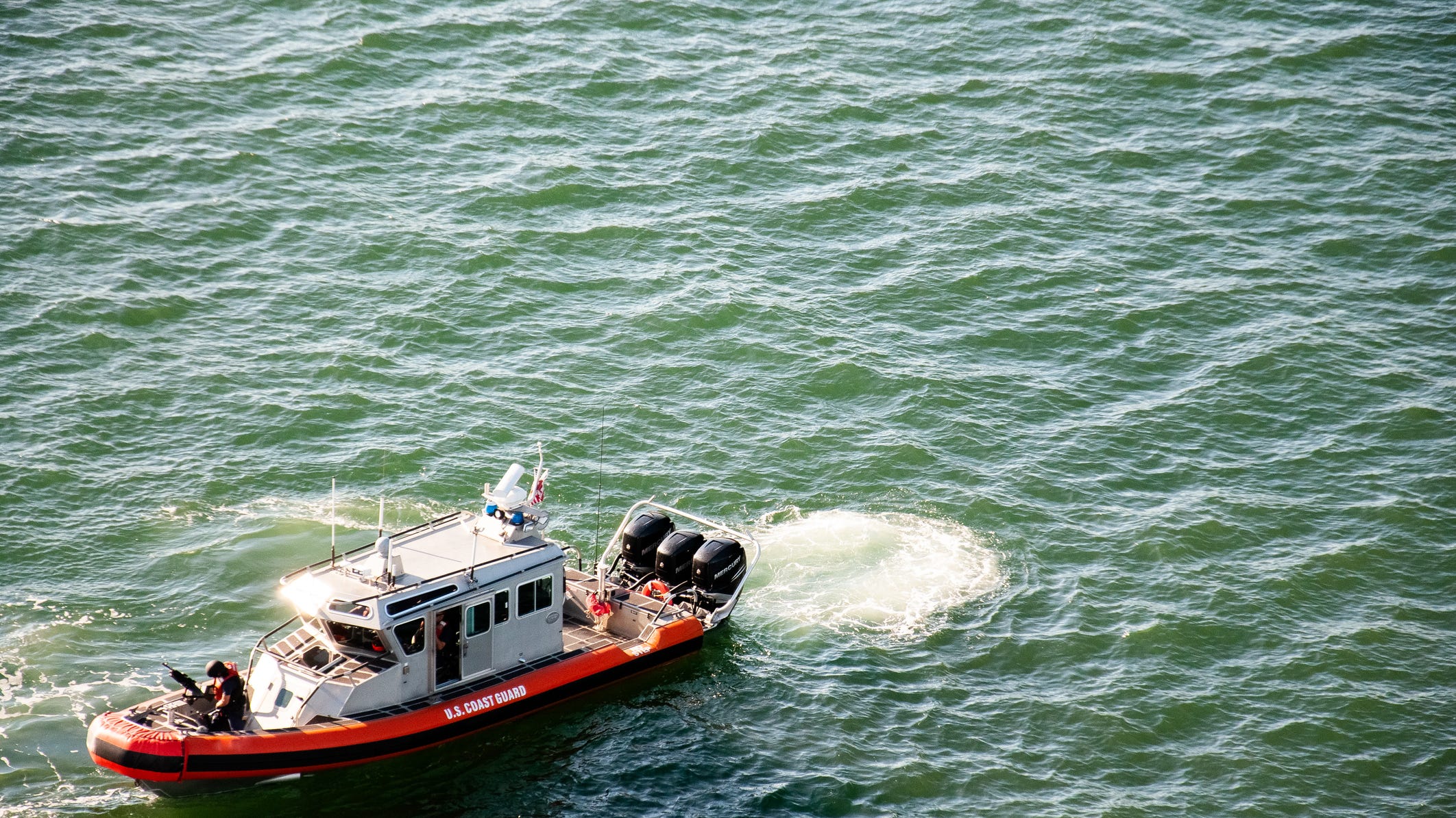 U.S. Coast Guard rescues migrants off Huntington Beach shoreline