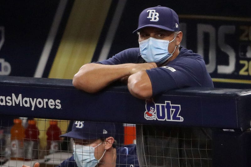 Kevin Cash looks on from the Rays dugout.