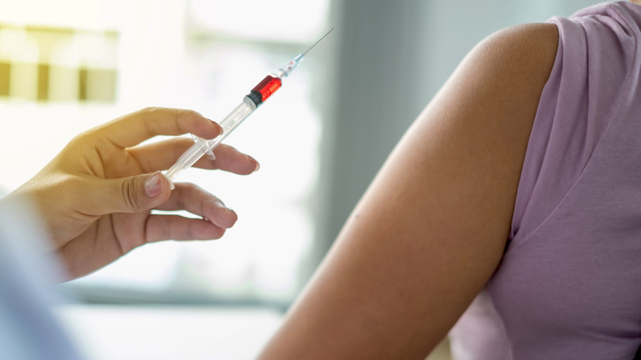 CDC says women reporting stronger side effects from COVID-19 vaccine than men
