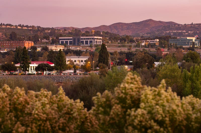 hilltop community at sunset