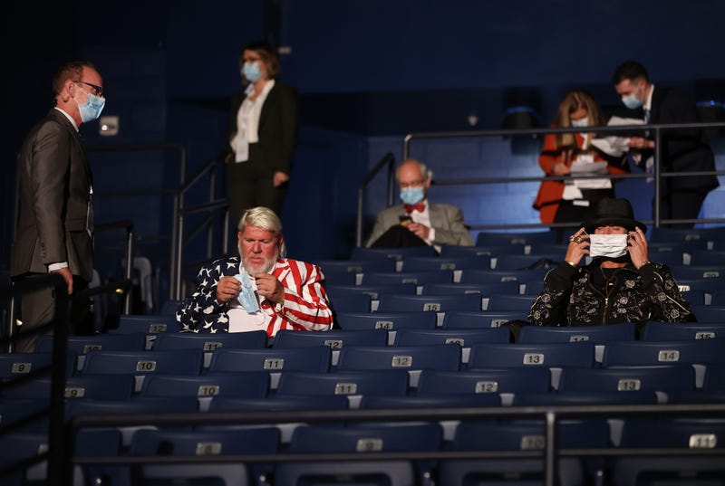 Kid Rock (R) and John Daly are asked to wear masks, at the final presidential debate between U.S. President Donald Trump and Democratic presidential nominee Joe Biden at Belmont University on October 22, 2020 in Nashville, Tennessee. 