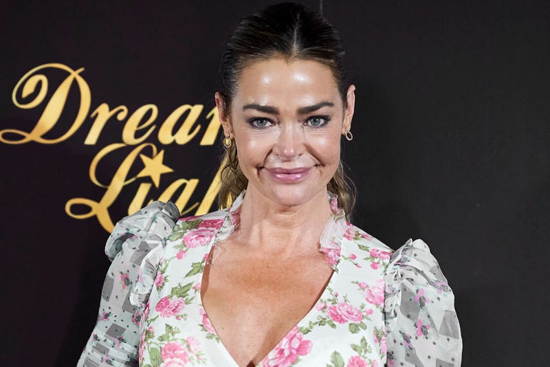 Actress Denise Richards attends "Glow & Darkness" photocall at the Palace Hotel on October 26, 2020 in Madrid, Spain.