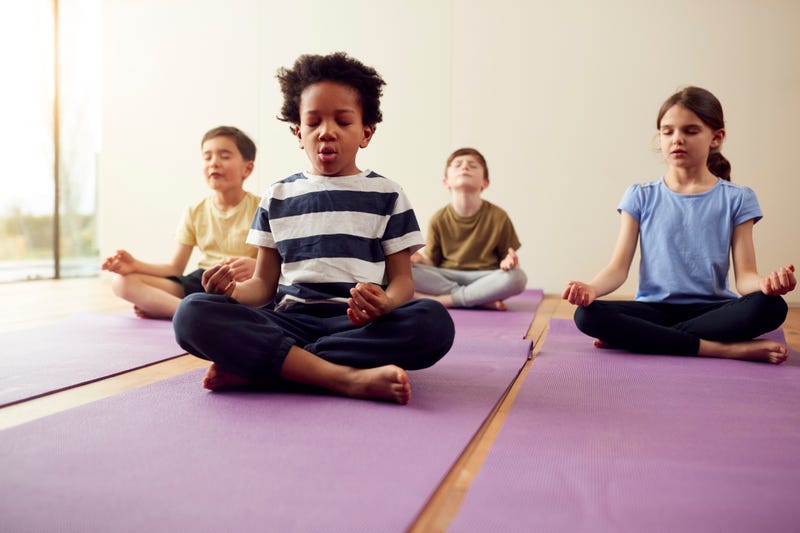 Kids doing yoga