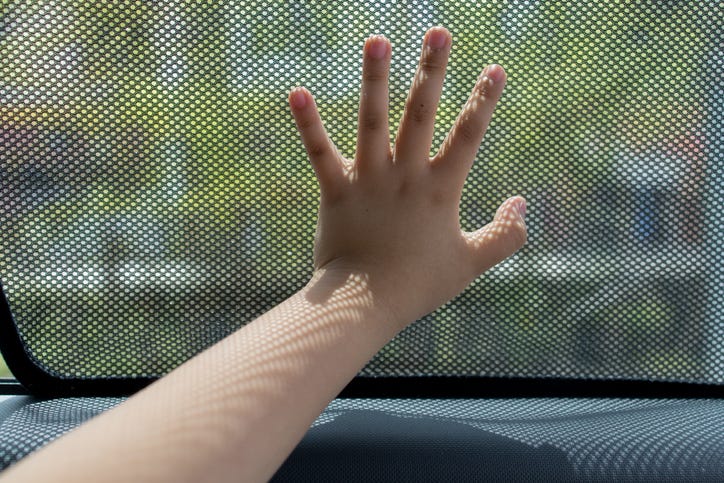 kid in car