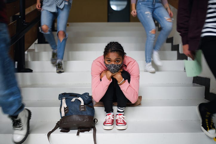 Young student struggling. 