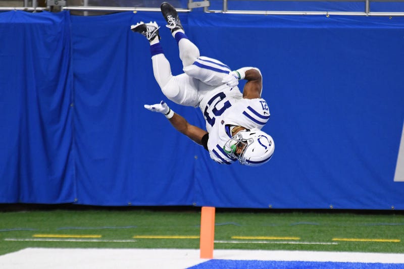 Nyheim Hines does his signature flip after scoring a touchdown.