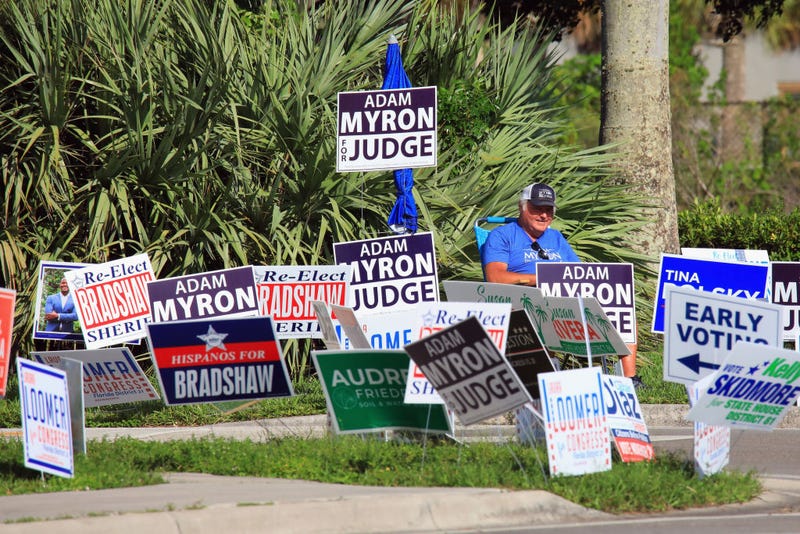 Photo of campaign signs in Florida.