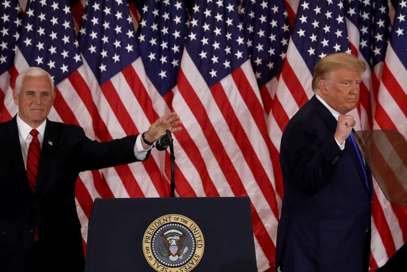 U.S. President Donald Trump and Vice President Mike Pence appear on stage on election night in the East Room of the White House in the early morning hours of November 04, 2020 in Washington, DC. 