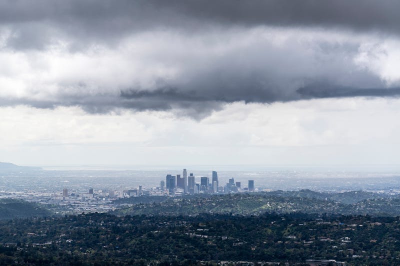 FILE - An undated photo of dark storm clouds above Los Angeles.