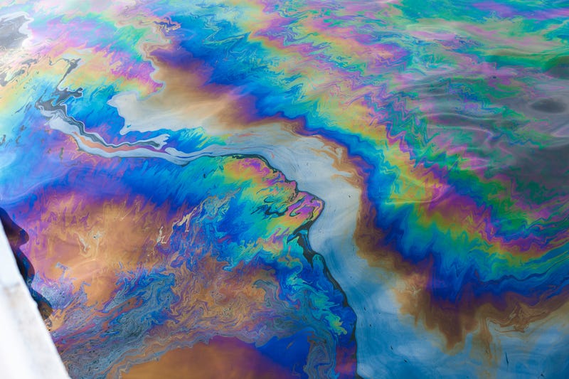 Authorities in Genesee County are scrambling to respond to a sizeable spill in the Flint River Thursday morning after several thousand gallons of an unknown black substance was discovered seeping in the water.