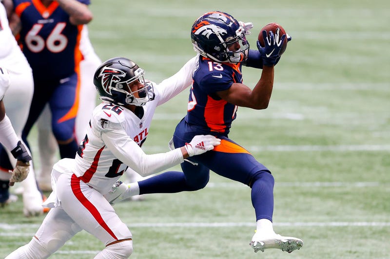 K.J. Hamler hauls in a ball in stride against the Falcons.