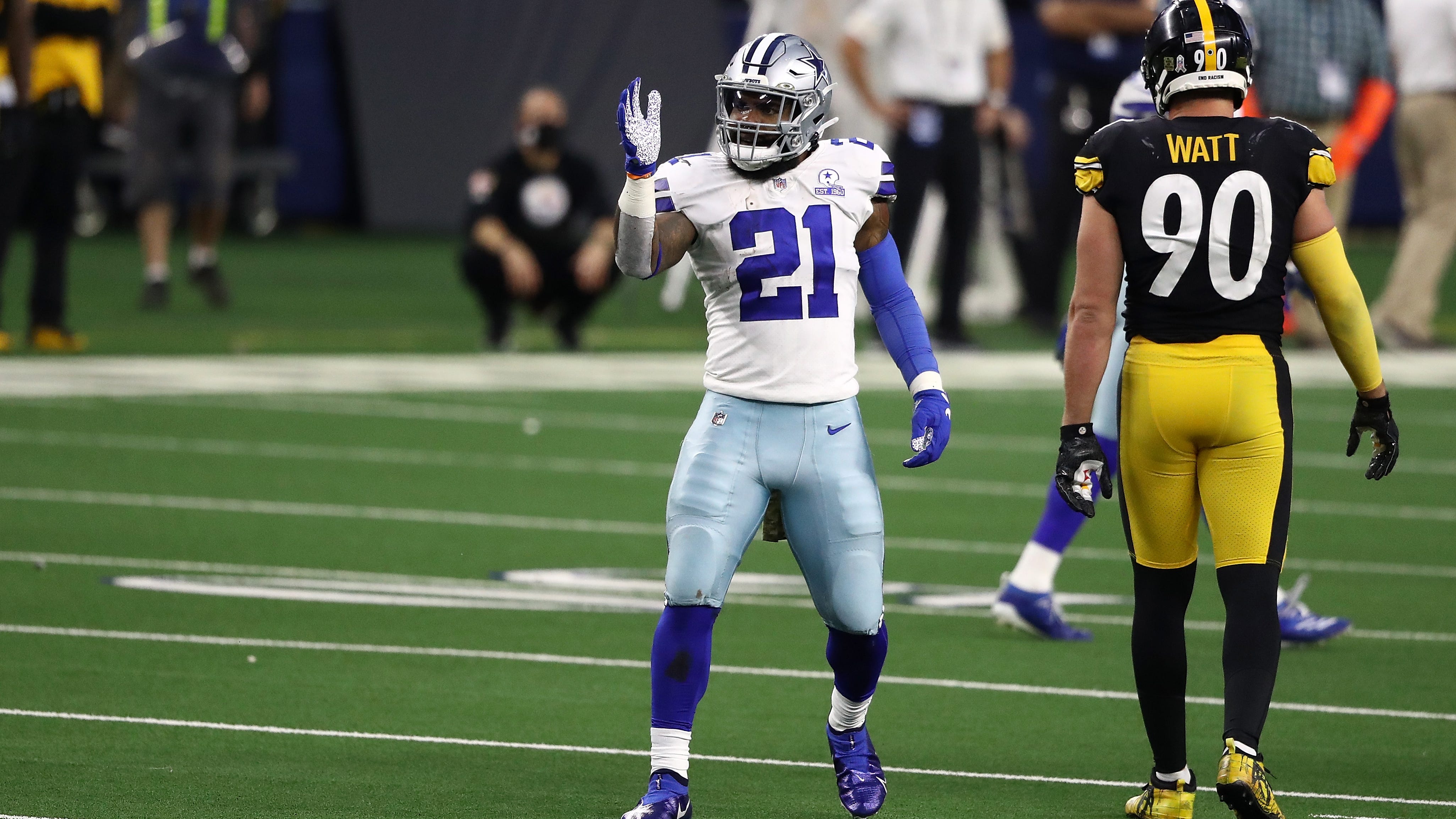 Slimmed-down Ezekiel Elliott opens camp at 218 pounds, his lightest weight since college