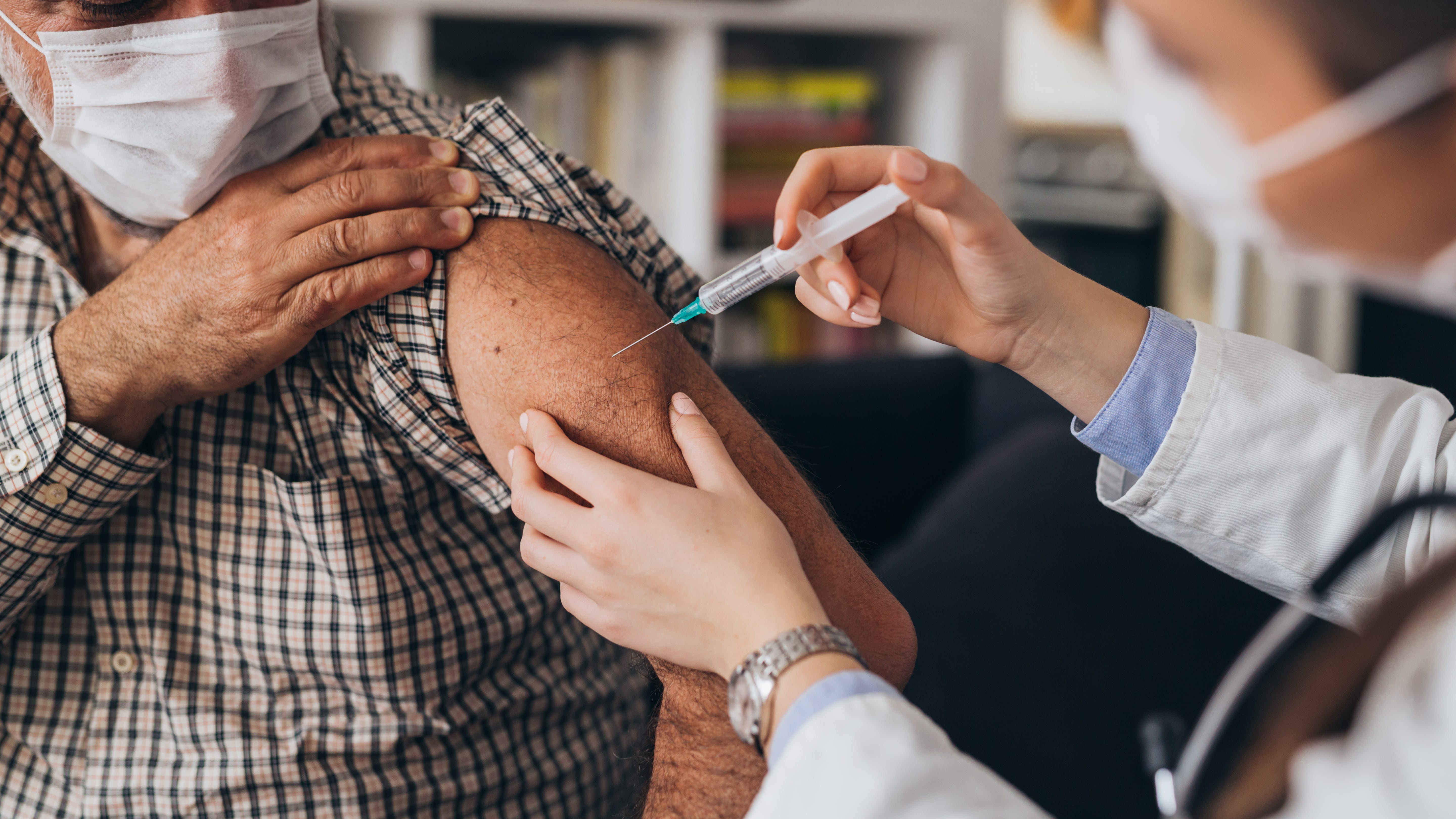 Loretto Hospital staff inoculates Cook County judges who were not yet qualified to receive the COVID vaccine