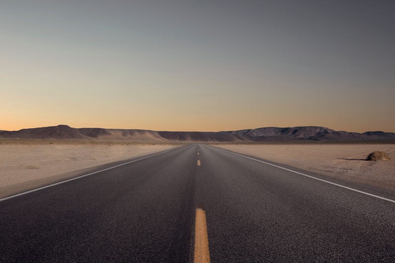 Panoramic view of hot summer road through the Nevada desert