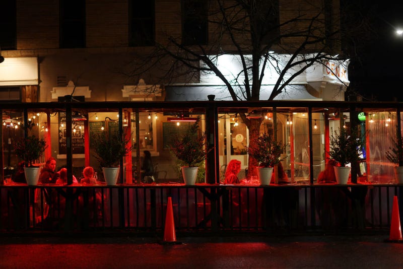 People eat in a covered outdoor area at a restaurant and bar in Brooklyn on November 13, 2020 in New York City. 