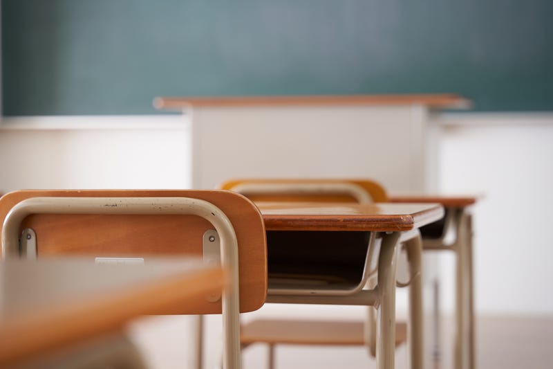 school desks in classroom