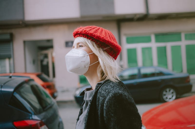 Woman wearing KN95 mask