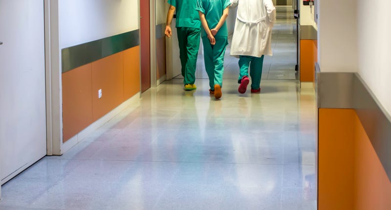 Hospital employees in a hallway