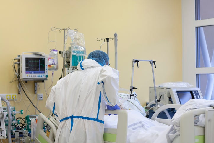 Nurse helping a patient who is ill. 