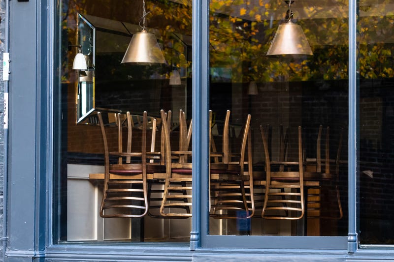 Window of an empty restaurant forced to close amid COVID-19 pandemic