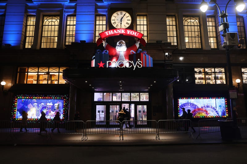 People look at the newly revealed Macy's Herald Square holiday windows on November 19, 2020 in New York City.