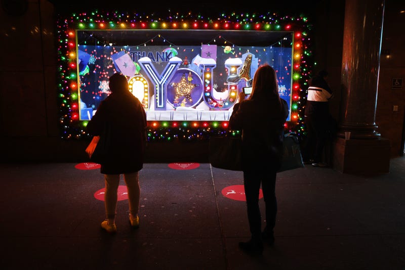 People look at the newly revealed Macy's Herald Square holiday windows on November 19, 2020 in New York City.