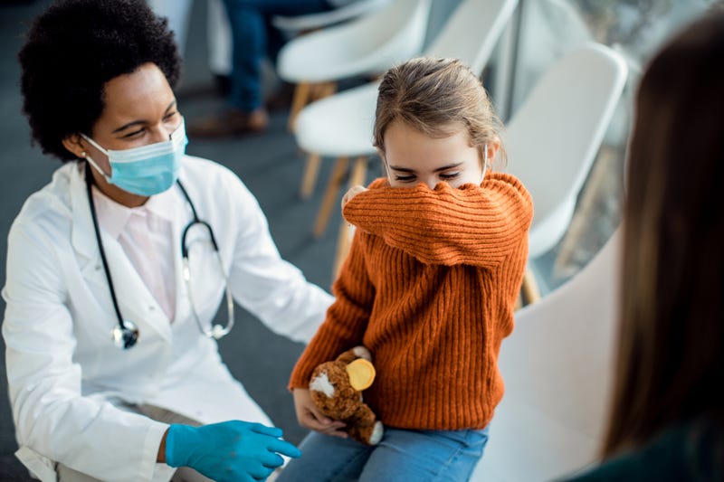 Child coughing stock photo. 