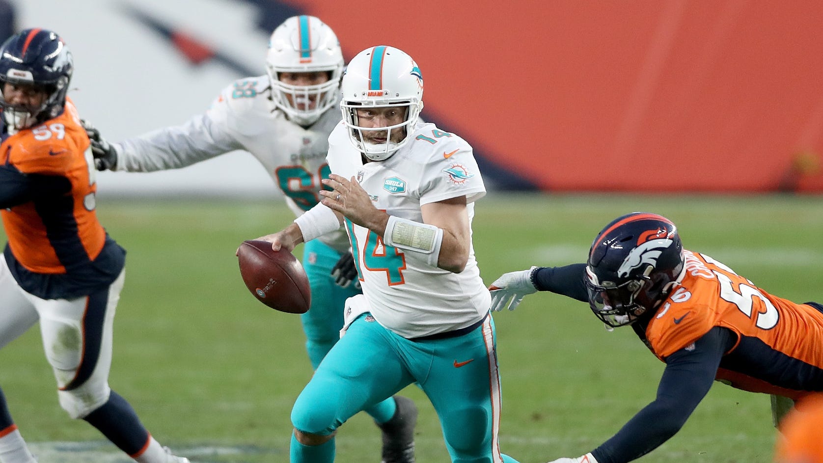 Rivera punts QB decision to 2022 by signing Fitzpatrick
