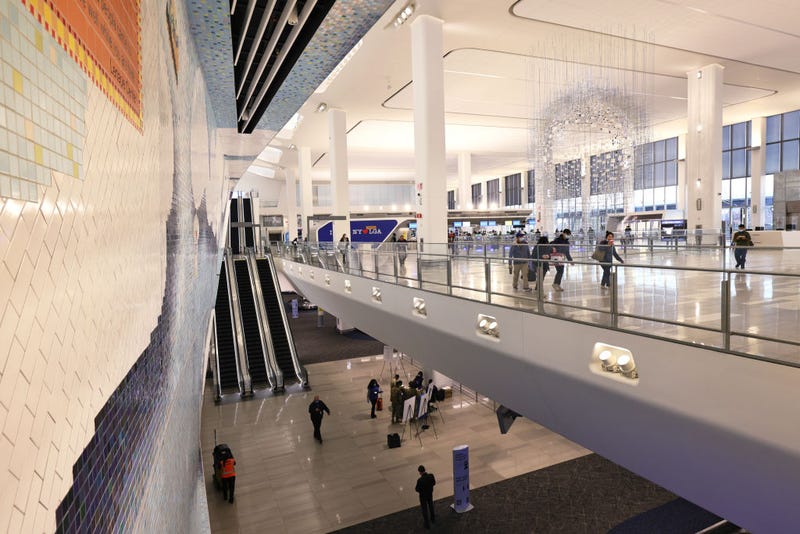 People walk through LaGuardia Airport on Nov. 25, 2020 in the Queens borough of New York City.