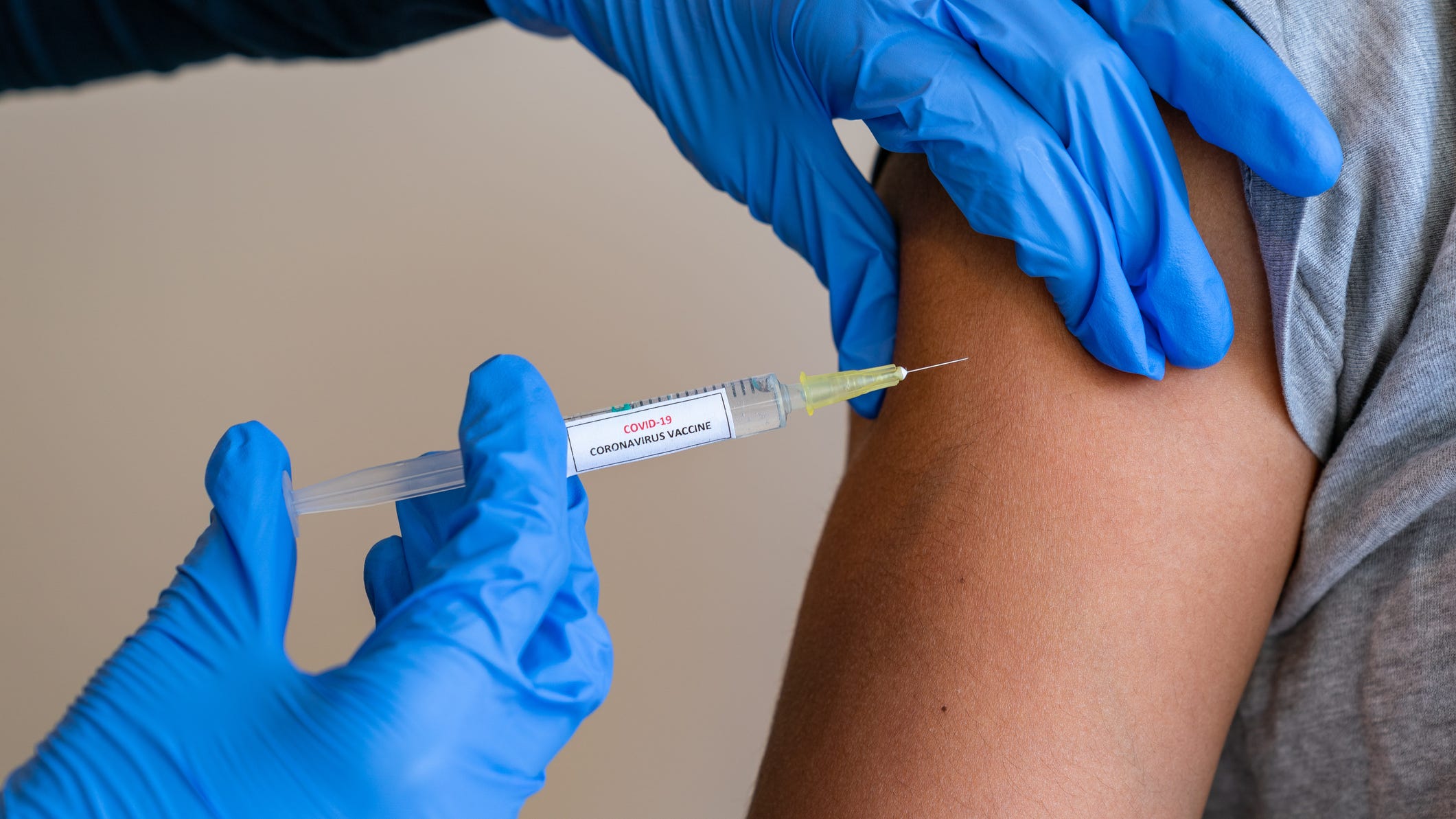 Americans are getting vaxxed at slowest pace since mid-July as COVID surges