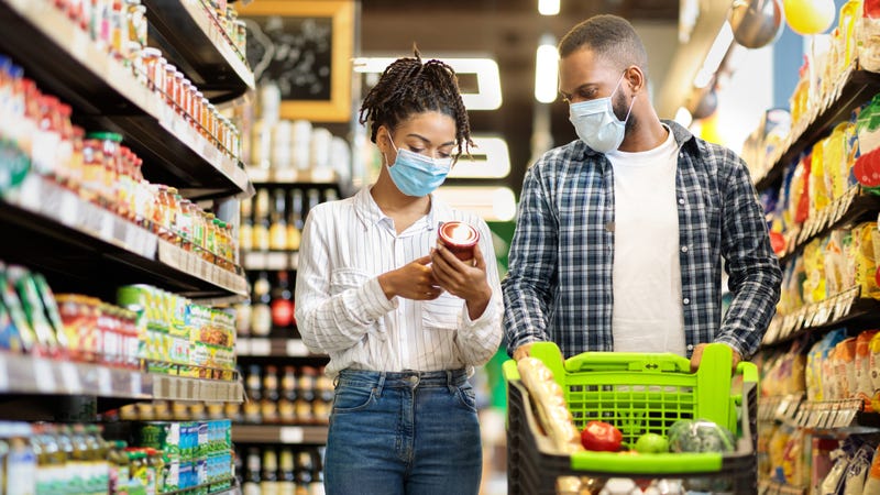 Couple Buying Groceries Wearing Face Mask