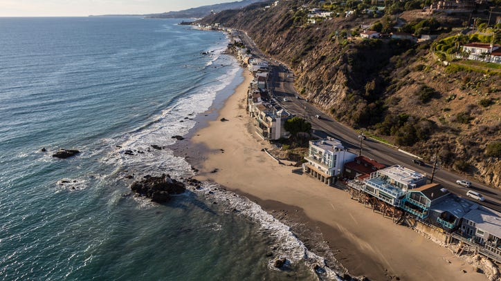 Driver dies after car plunges off Malibu mountainside