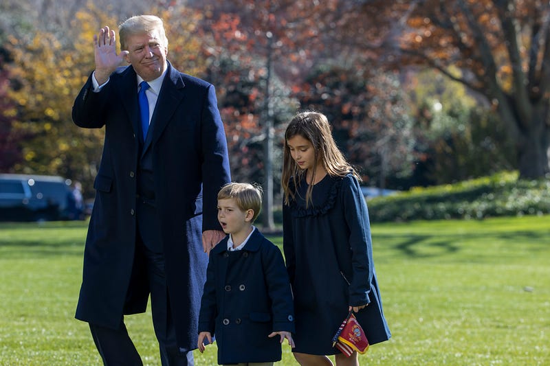 President Donald Trump, followed by his grandchildren, Arabella Kushner, Theodore Kushner walk on the south lawn of the White House on November 29, 2020 in Washington, DC. President Trump spent the weekend at Camp David and at Trump National Golf Club in Sterling, Virginia. 