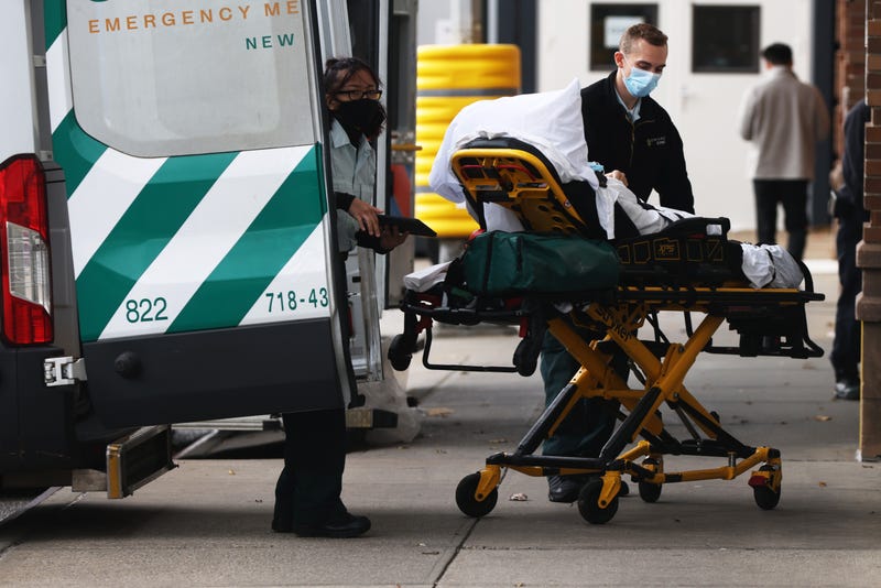 Medical workers deliver a patient to the Maimonides Medical Center in Brooklyn on December 02, 2020 in New York City.