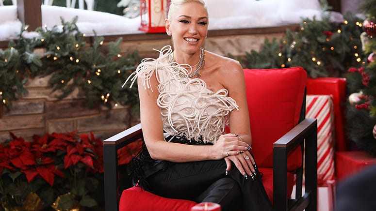 See Gwen Stefani show off engagement ring… and puppies