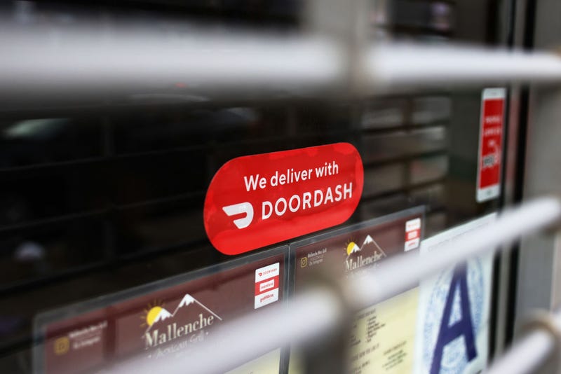 A Doordash sticker is seen on a window at Mallenche Mexican Grill in the Flatbush neighborhood of Brooklyn on December 04, 2020 in New York City. 