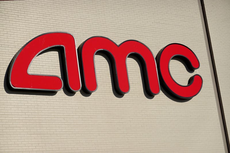 HARWOOD HEIGHTS, ILLINOIS - DECEMBER 04: An AMC Theatres logo hangs on the front of one of the company's movie theaters shuttered by the coronavirus COVID-19 on December 04, 2020 in Harwood Heights, Illinois. In what could be another blow to the theater industry, Warner Bros. Pictures on Thursday announced that all of its 2021 films will stream on HBO Max during the same time the films will be playing in theaters.