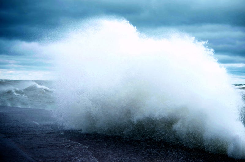 Large Wave Crashing into Breaker Wall