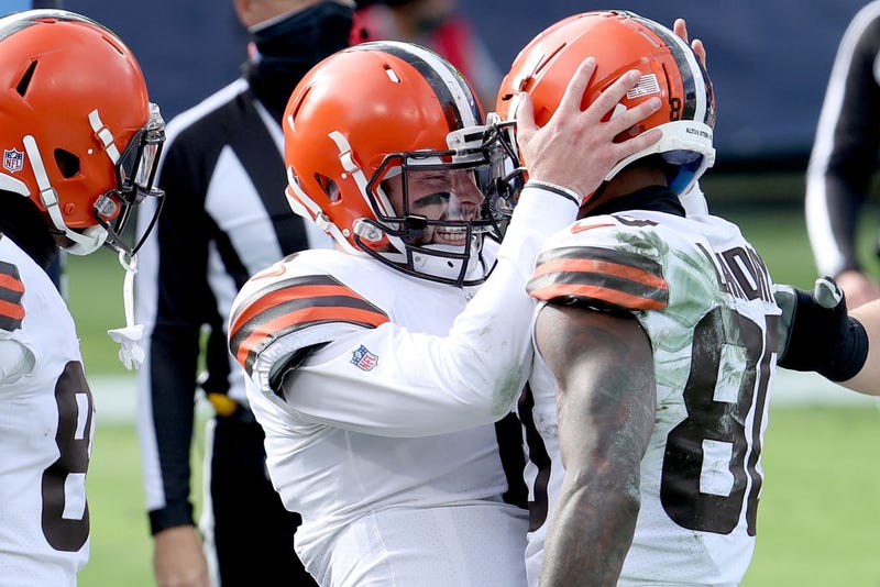 Quarterback Baker Mayfield #6 and Jarvis Landry #80 Cleveland Browns celebrate a touchdown against the Tennessee Titans