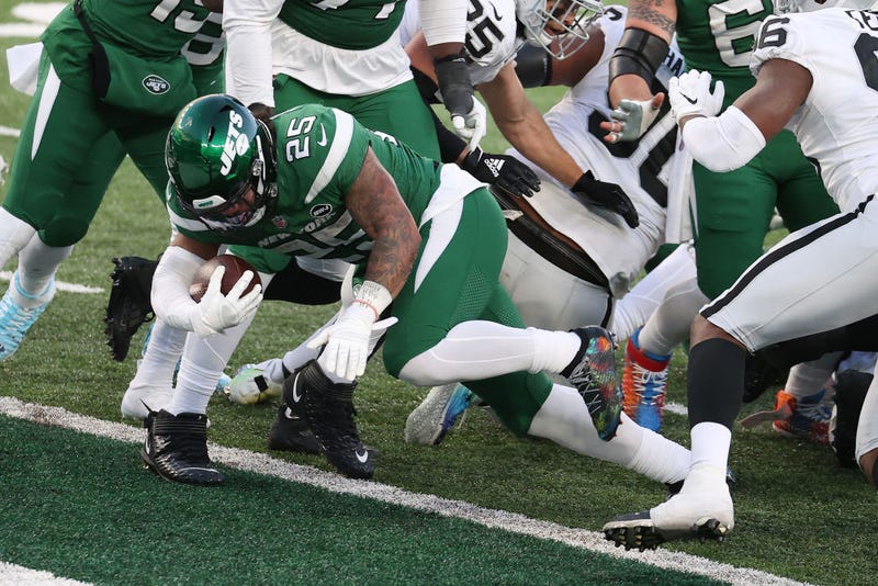 Ty Johnson plunges into the end zone in Week 13.