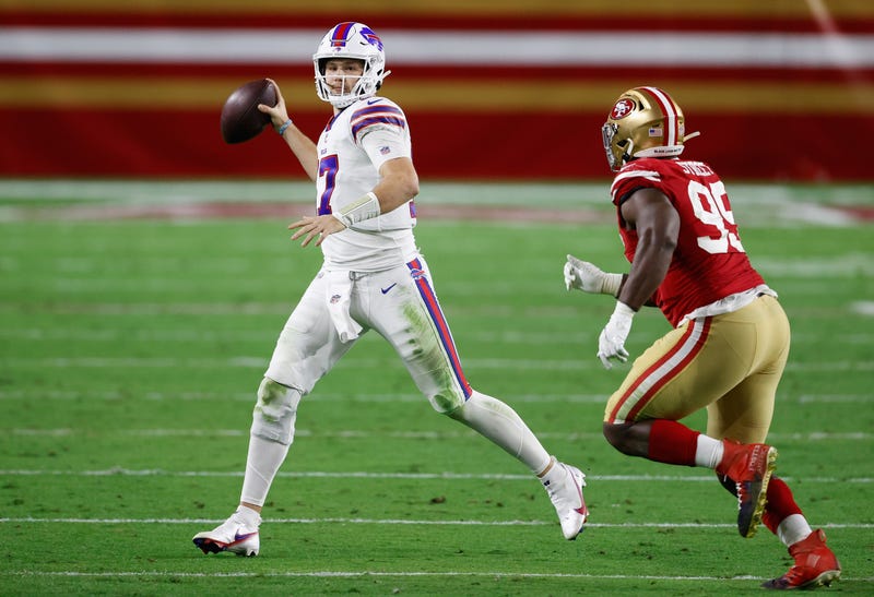 Quarterback Josh Allen #17 of the Buffalo Bills drops back to pass during the NFL game against the San Francisco 49ers at State Farm Stadium on December 07, 2020 in Glendale, Arizona. The Bills defeated the 49ers 34-24.