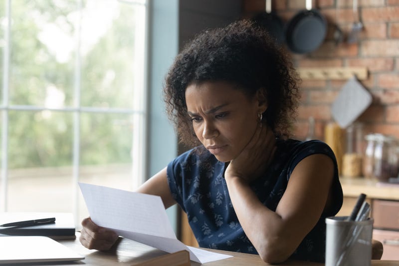 black woman looking concerned