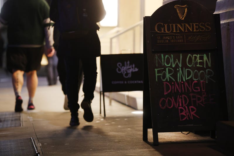 File photo: A sign outside a bar in Manhattan