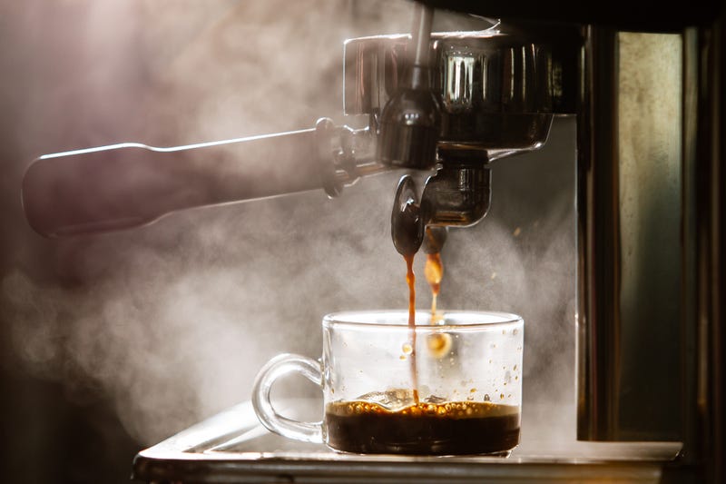 Coffee pouring into a cup. 