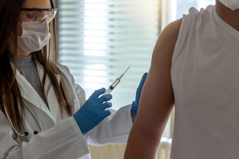Man getting COVID vaccination